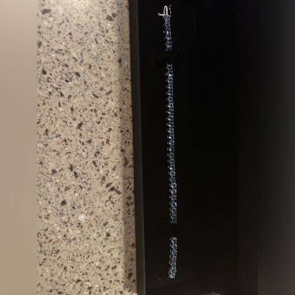 ZALES BLUE TOPAZ STERLING SILVER TENNIS BRACELET - Picture 3 of 6